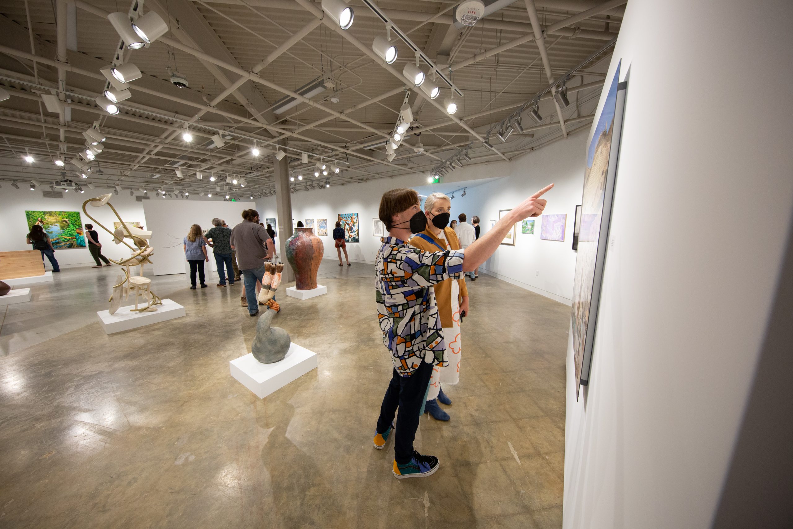 students looking at art in Owen Hall